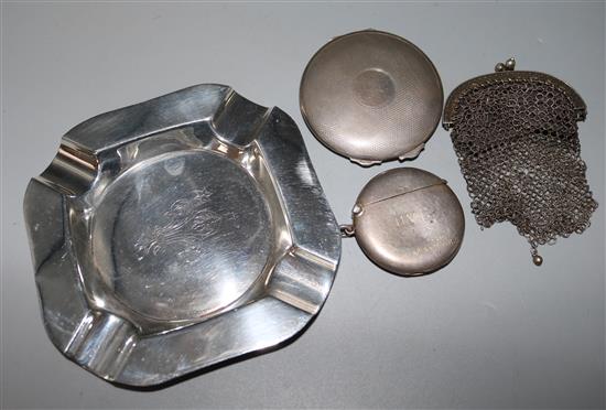 Silver vesta, silver compact, silver ashtray and a mesh bag